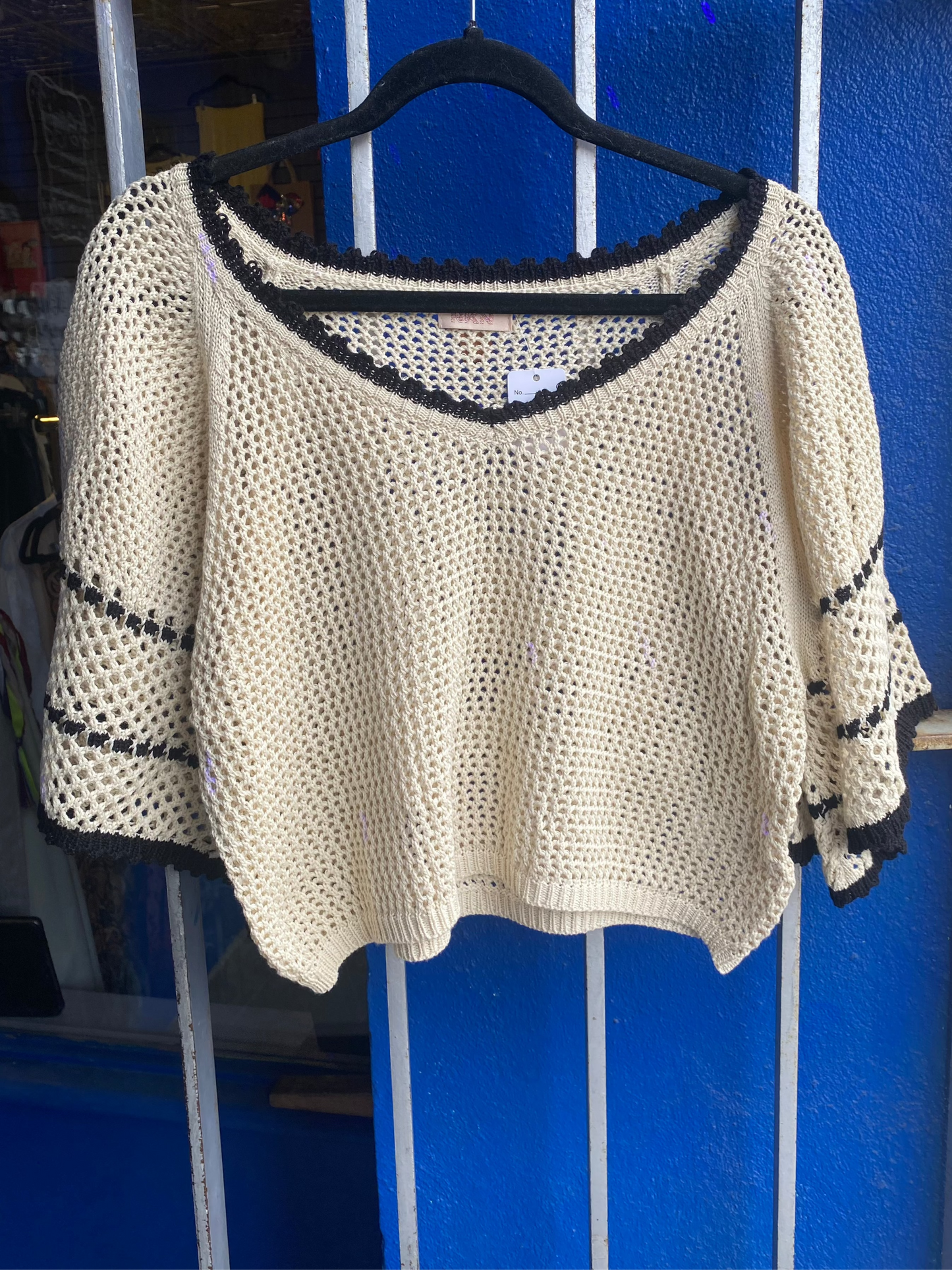 Oversized knit sweater with black trim- Cream and Black