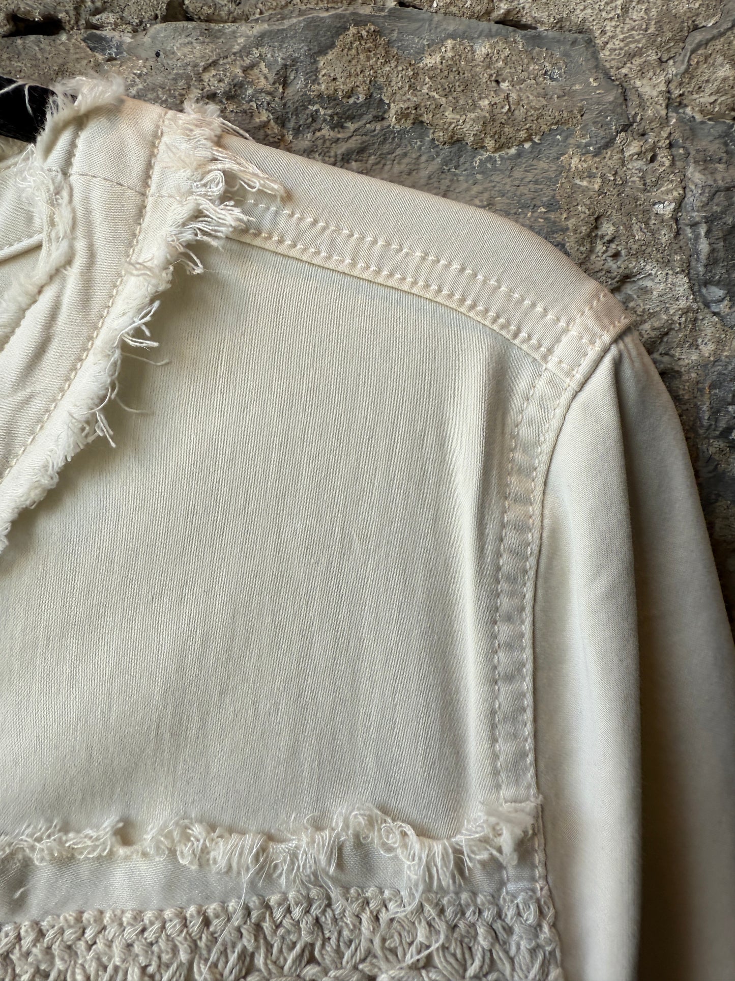 Collarless Stretch Jean Jacket with macrame frayed edges and pockets- Ivory