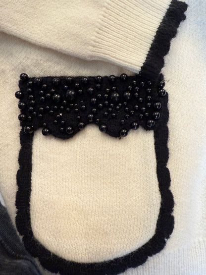 Ivory and Black sweater with black pearl details